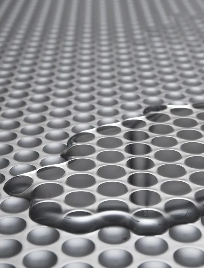 Aqua Stop water drip mat in black with steel overlay